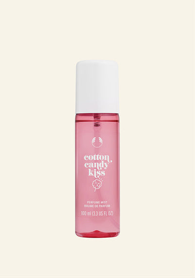 Pink perfume bottle labeled 'cotton candy kiss' on a white background